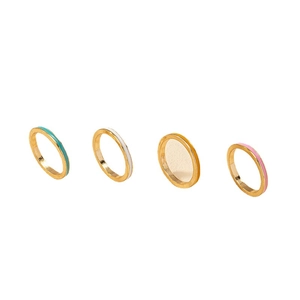 Minimalist rainbow enamel stackable ring set in four vibrant colors with gold metal finish