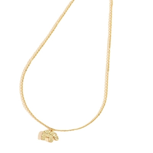 Minimalist gold elephant pendant necklace with intricate cutout design on a thin chain