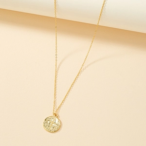 Golden coin pendant necklace with embossed cross design on a minimalist O-chain link