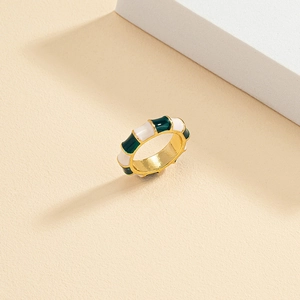Bamboo style enamel ring with green and white glaze and gold metal accents