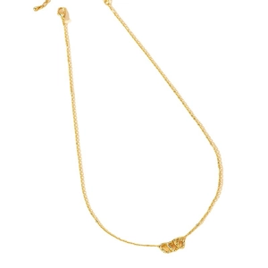 Minimalist gold necklace with three interlocking hammered rings on a delicate chain