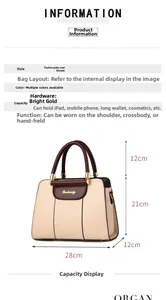 Detailed view of beige Boston bag showing spacious interior and golden hardware features
