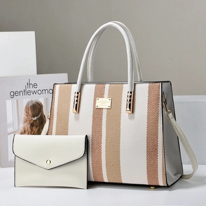 Elegant striped contrast tote bag with small envelope pouch for stylish commuters
