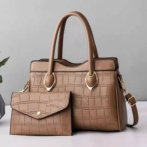 Brown crocodile embossed tote bag set with matching envelope clutch and gold hardware