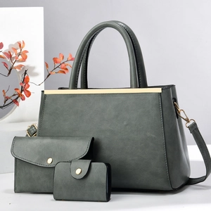 Three-piece solid color tote bag set with metal trim and detachable strap in dark green