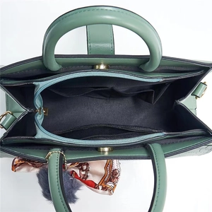 Dark green stone texture tote bag with silk scarf and organized interior compartments