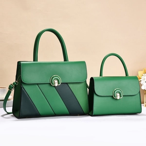 Green PU leather two-piece handbag set with gold buckle and stylish textured detailing