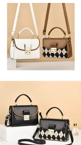 Detail view of four stylish handbags with gold clasps and top handles in various colors