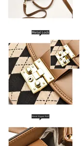 Detail of vintage tote showing gold square lock and smooth hardware zipper head