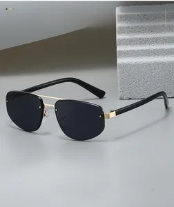 Close-up of stylish aviator sunglasses featuring premium metal double bridge and dark lenses