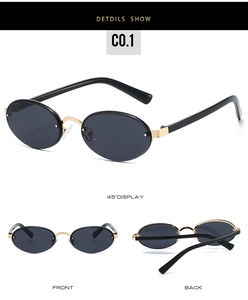Detailed views of vintage oval sunglasses with black lenses and gold metal bridge