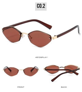 Detail view showing brown irregular lenses and gold metal bridge of retro sunglasses