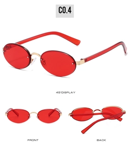 Detailed views of vintage oval sunglasses with red lenses and gold metal frame