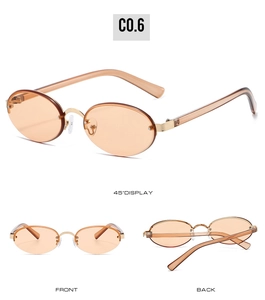 Detailed views of vintage oval sunglasses with amber lenses and golden metal hinges