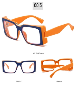 Detail view of bold orange and blue oversized frame glasses with gold metal nose bridge accent