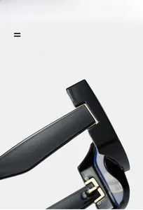Detail of high-quality black frame hinges with golden metal accents for fashion glasses