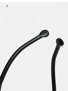Macro detail of ergonomic curved black sunglasses legs for comfortable temple wear