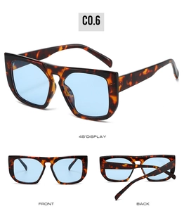 Detailed views of oversized tortoiseshell square sunglasses with blue tinted lenses