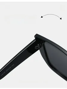 Close-up of durable metal hinges on oversized square black frame sunglasses