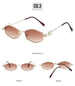 Detail of polygonal metal frame sunglasses with star crystal accents and gradient lenses