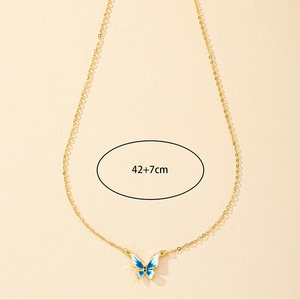 Golden necklace with blue butterfly enamel pendant and 42+7cm adjustable chain