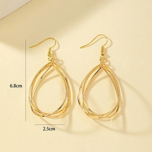 Macro shot of layered golden water drop earrings showcasing metallic texture and 6.8cm size