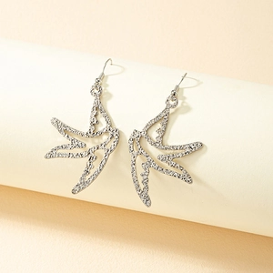 Silver swallow bird drop earrings with hammered metal texture and hook design
