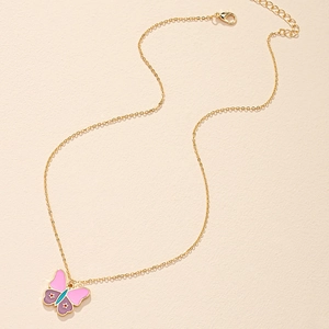 Schicke goldene Schmetterlingskette mit rosa und violettem Emaille und rotem Stern