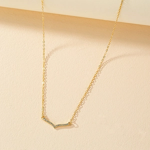 Elegant 18K gold V-shaped necklace featuring sparkling micro-pave cubic zirconia accents