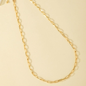 Minimalist golden paperclip chain necklace with sleek rectangular links and lobster clasp