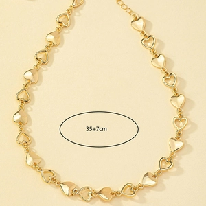 Golden heart link necklace with hollow and solid charms, length 35+7cm adjustable chain