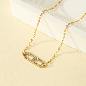 Minimalist Gold Plated Alloy Necklace For Women Featuring Geometric Oval Rhinestone Pavé Pendant Jewelry Accessory