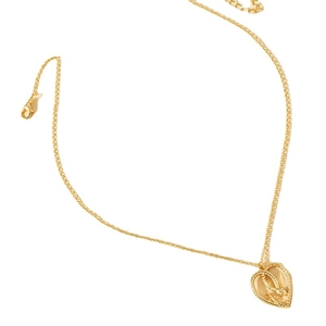 Golden heart-shaped pendant necklace featuring an intricate coiled snake design on white background