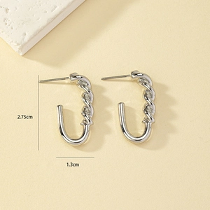 Detail view of silver twisted U-shape stud earrings with dimensions 2.75cm by 1.3cm