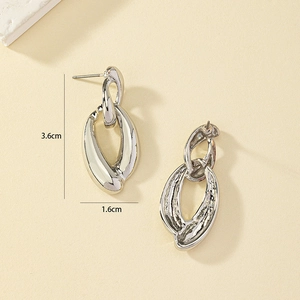 Detailed view of silver alloy geometric chain earrings with 3.6cm by 1.6cm dimensions