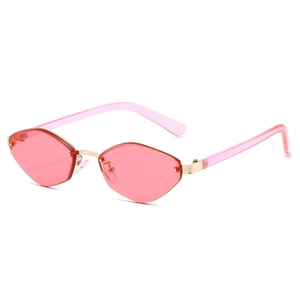 Retro polygonal rimless sunglasses with pink lenses and gold metal frame for UV protection