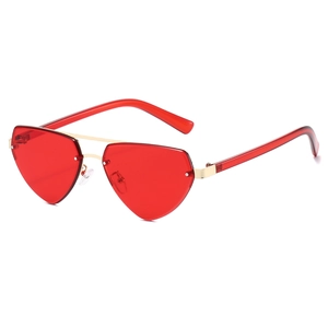 Lunettes de soleil cœur rouges sans monture avec double pont en métal doré chic