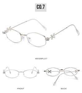 Detailed views of silver polygonal metal frames with rhinestone cross decor on temples