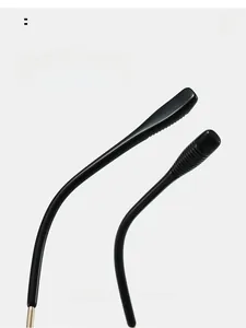Detail of curved black matte eyewear legs with anti-slip wave texture for comfort