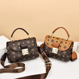 Retro printed flap handbags in dark and light brown with wide logo shoulder straps
