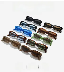 Multiple stylish oval sunglasses displayed in various colors on a white background