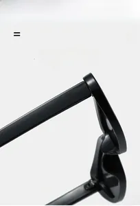 Detail view of lightweight and flexible hinge structure on black oval sunglasses