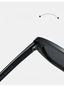 Close-up of durable metal hinge and 3180 size parameters on black sunglasses frame