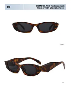 Gros plan de lunettes de soleil rétro œil-de-chat avec monture écaille et verres gris