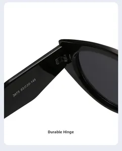 Close-up of sturdy metal hinge and size parameters on black cat eye sunglasses