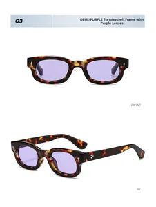 Détail de lunettes de soleil rectangulaires écaillées avec verres violets et rivets
