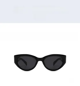 Front view of stylish black cat eye sunglasses with grey lenses and wide temples