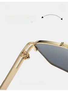 Detail of durable textured metal hinges on square gold sunglasses for lasting use