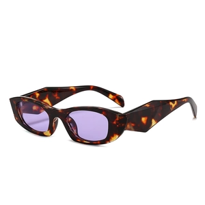 Lunettes de soleil ovales rétro écaillées avec verres violets transparents larges