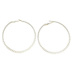 Minimalist large gold hoop earrings with fine twisted woven texture and metallic finish